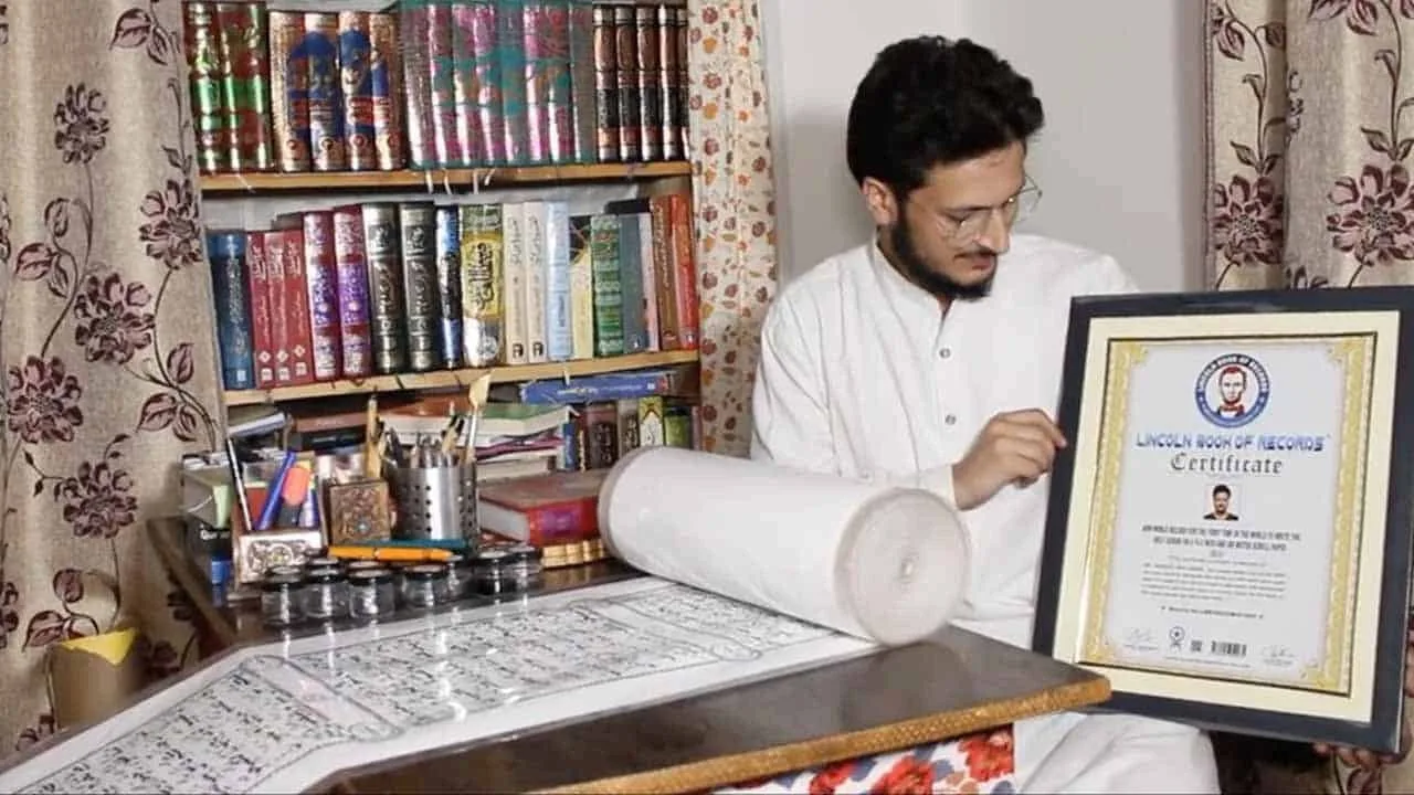 Man writes the Quran on a 500-meter-long scroll, working for 18 hours a day, for seven months
