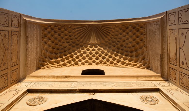 View of the restored Muqarnas located inside the deep-vaulted gateway.