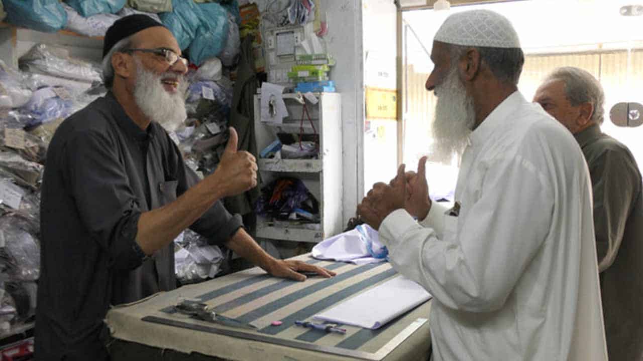 Deaf Pakistani outfitter tailors the way for workers with disabilities