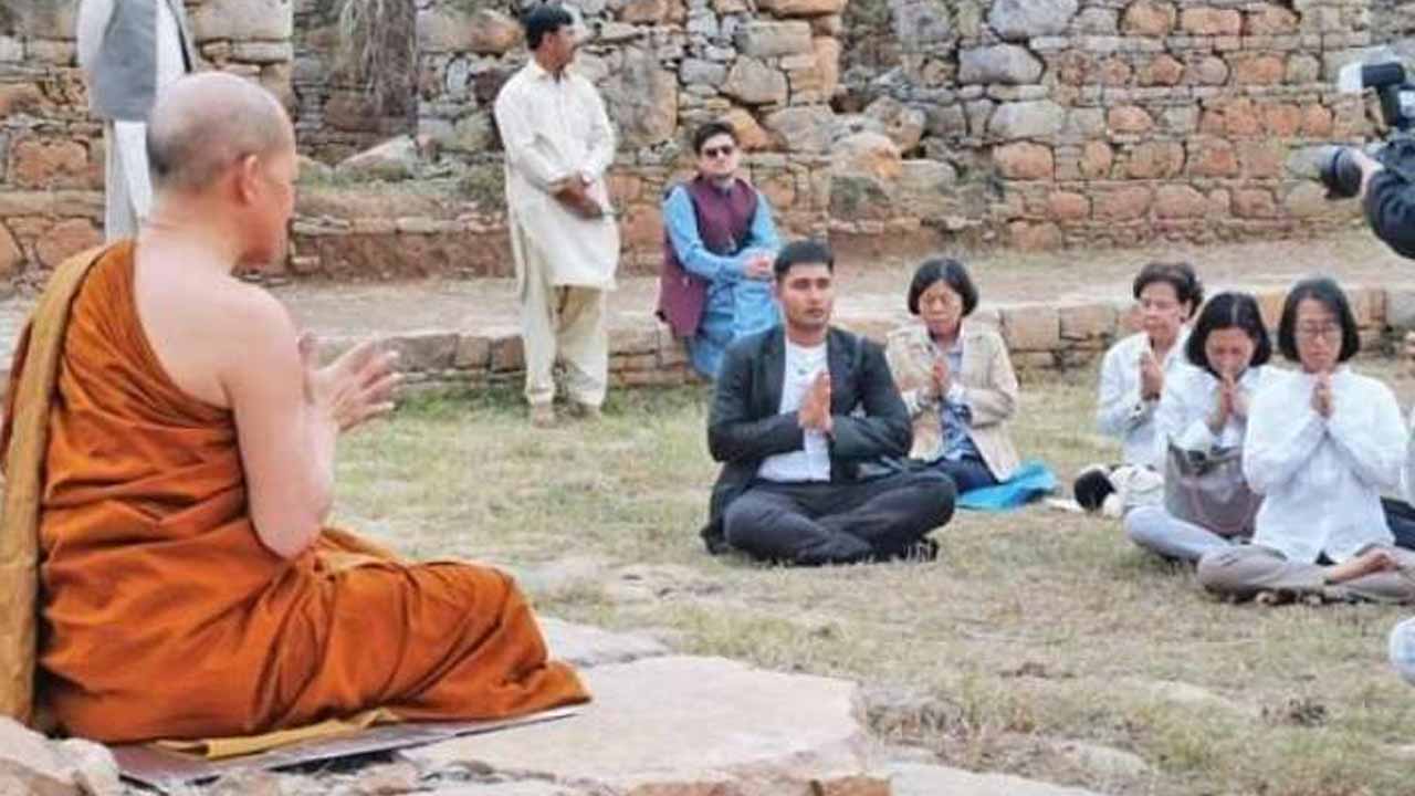 Thai monk visits Buddhist sites in Swat