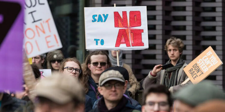Tech Boss Calls for ‘Minimum Wage’ on AI to Protect Jobs