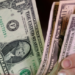 Dollar pulls back as US-Iran attacks pause, oil drops