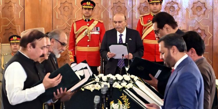 President administers oath to new federal, state ministers